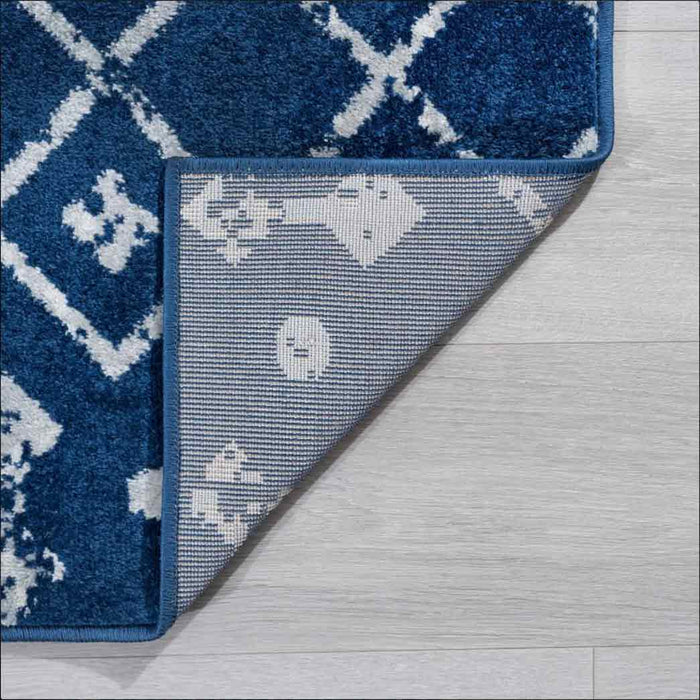 Tyse Area Rugs Jasmine Navy backing